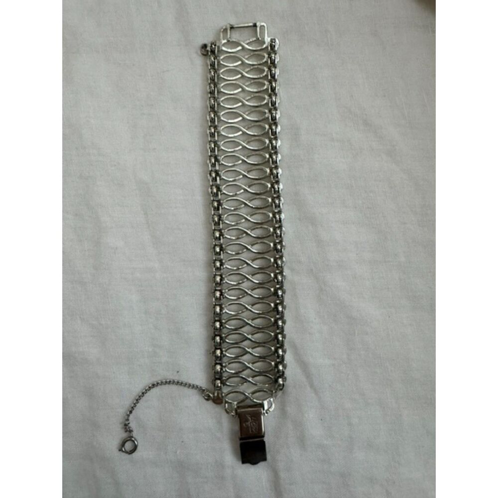 Vintage 1950s MDC Coro Pegasus Wide Silver-tone bracelet, 7.5' long.